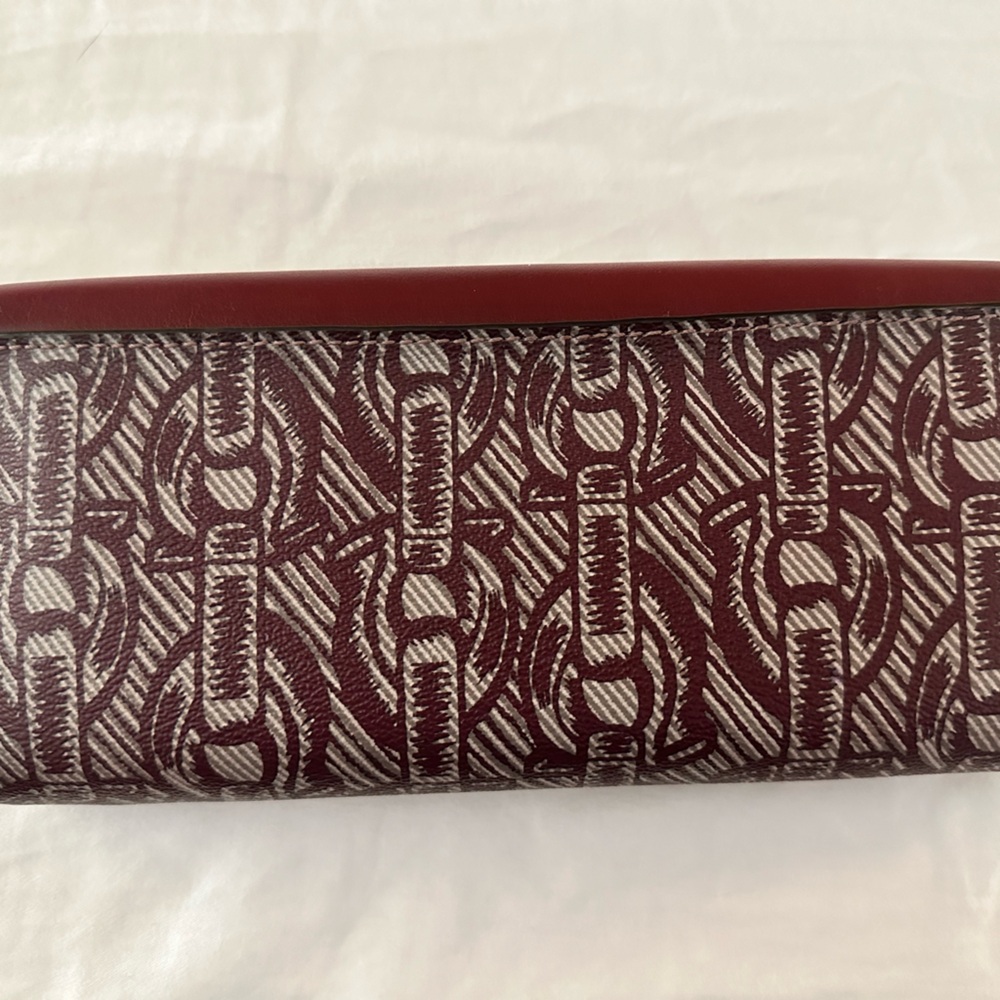 Coach Brand expandable wallet. Coin zipper, 12 card slots.
